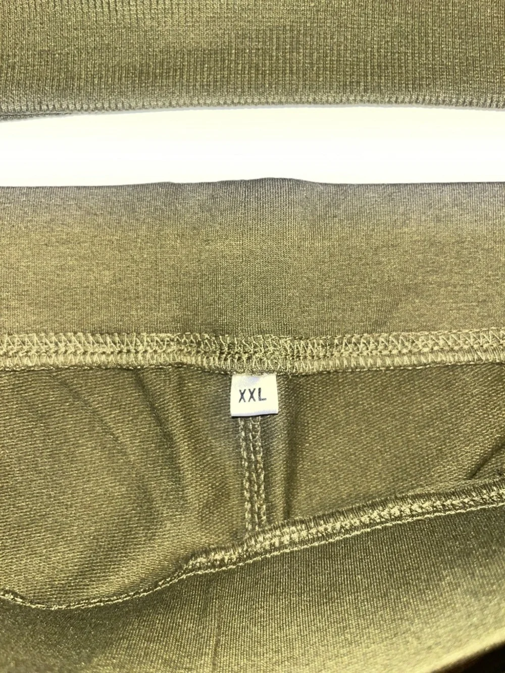 olive green Adidas matching sweatshirt and jogger set
